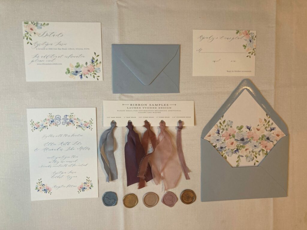 Lauren Yvonne Designs
www.laurenyvonnedesign.com
A sampling of her beautiful designs and accessories. Steel blue and spring flowers
Invitationsuite, invitation, weddinginvitation