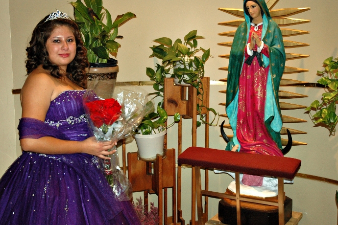 A young girl celebrating her Quinceañera birthday.